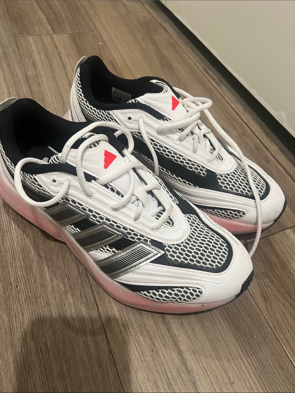 Women’s White and Black Athletic Sneakers with Pink Accent